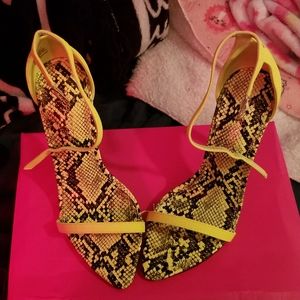 Neon green snake skin heels